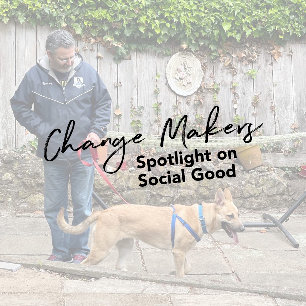 Man walking brown dog with the words Change Makers written atop the image